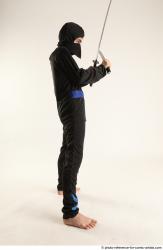 Man Young Athletic Fighting with sword Standing poses Casual Asian